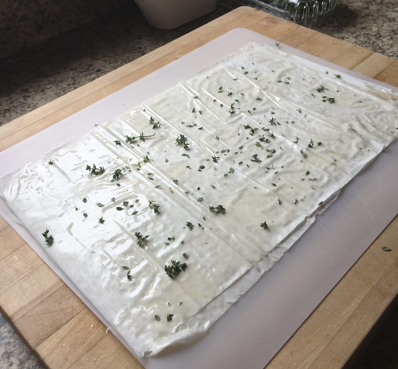 Filo dough with thyme leaves