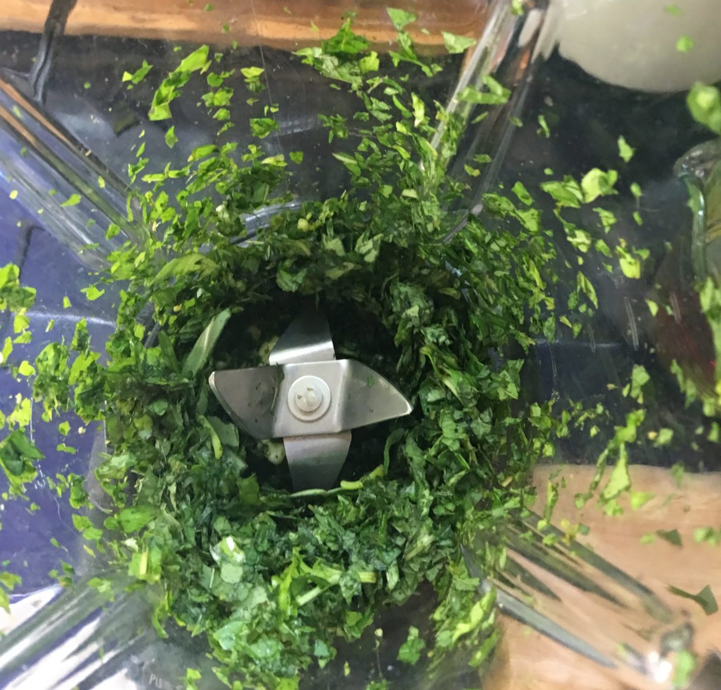 mint and basil chopped in a blender