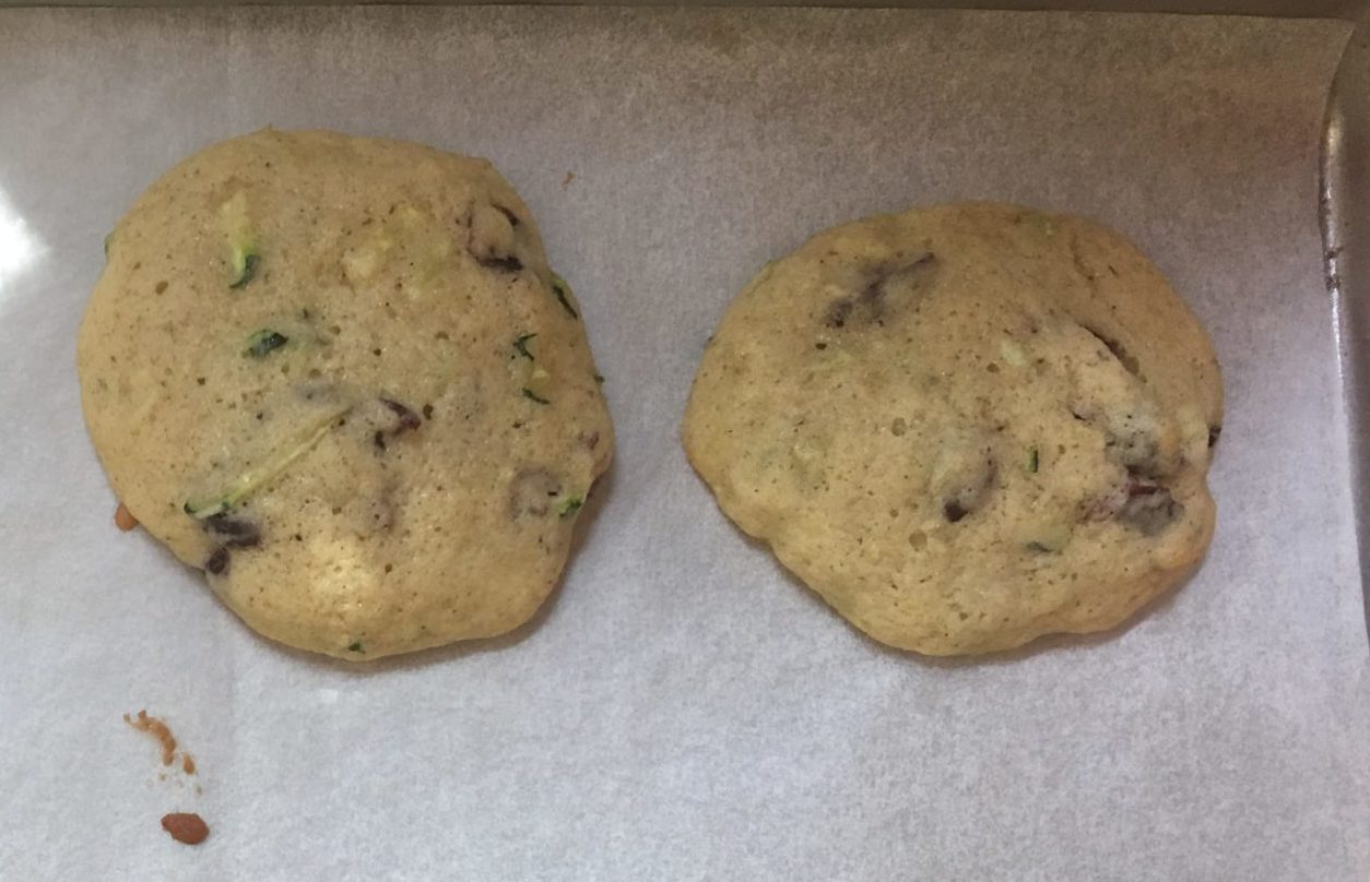 Zucchini and Cranberry Cookies on parchment paper