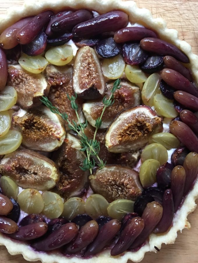 Grape and fig tart with honey, thyme and goat cheese
