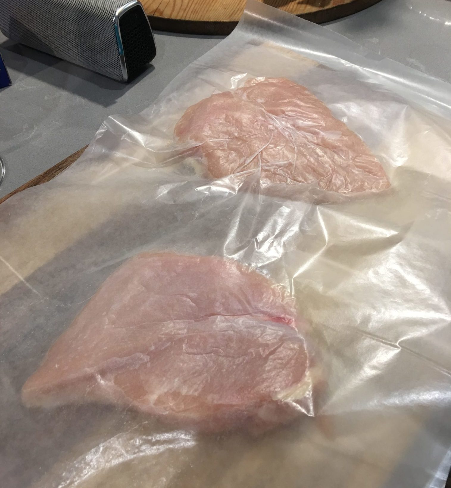 Chicken breast in wax paper