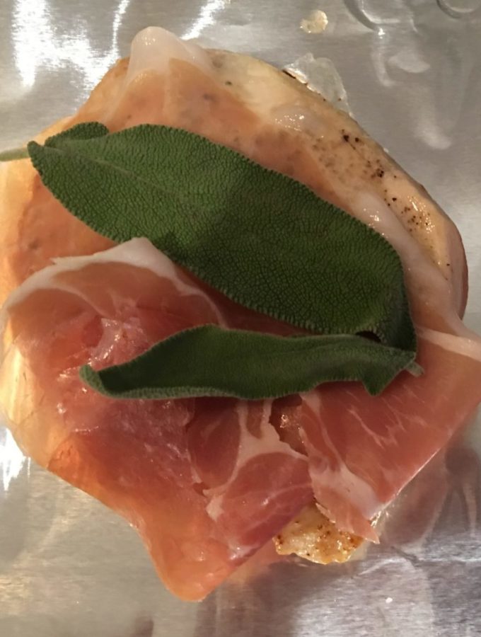 Prosciutto and sage leaves on chicken breasts
