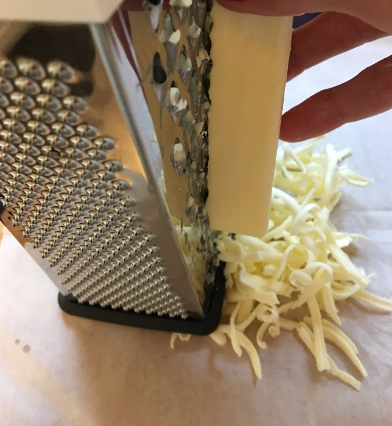Butter being grated