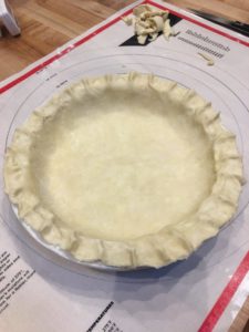 raw pie pastry in tin