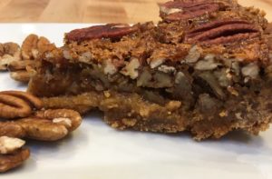 Pecan pie on a white plate