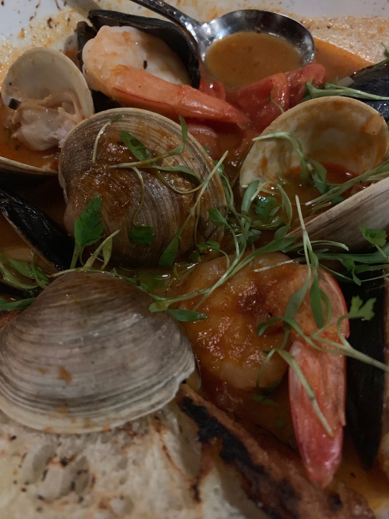 Shrimps, clams and seafood broth