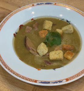 Puree of pea soup with ham
