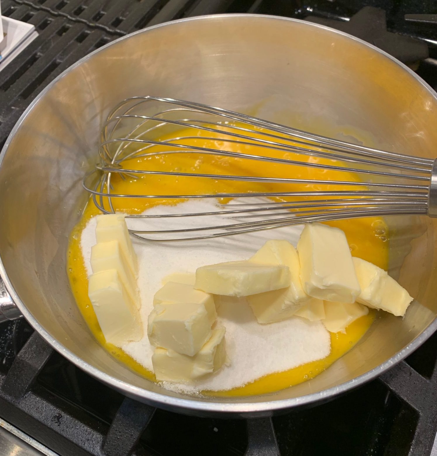 butter and sugar with beaten egg yolks