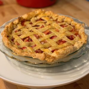 Strawberry rhubarb pie with mint