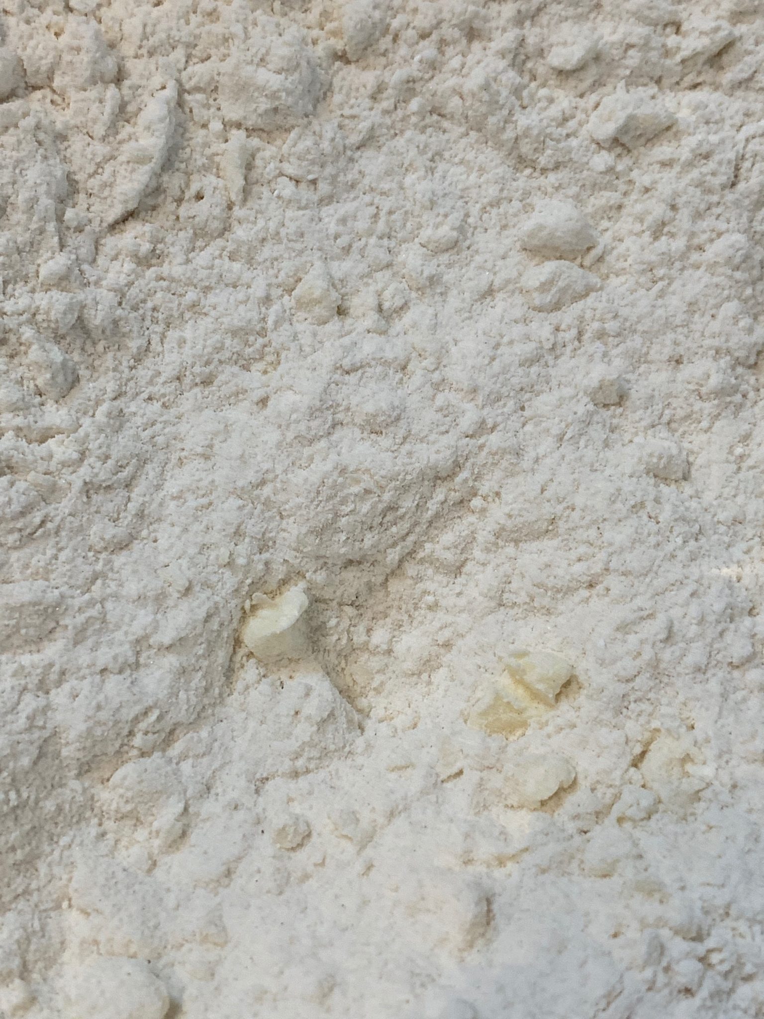 Butter cut into dough to look like coarse meal