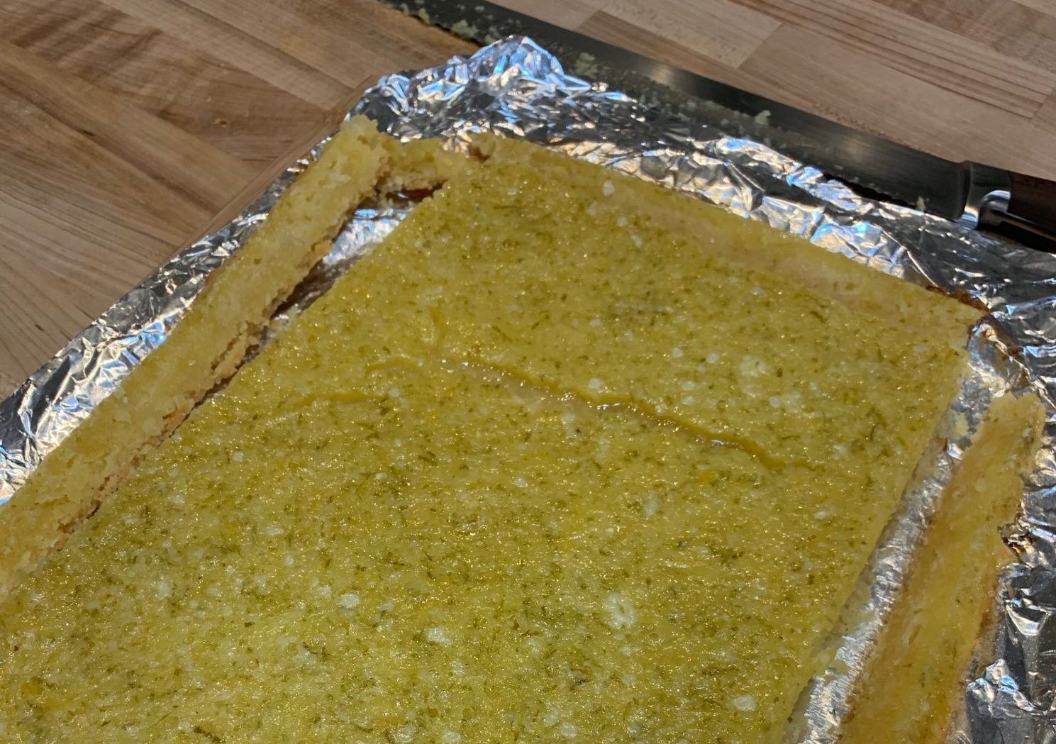 Showing the crack in a lemon bar topping