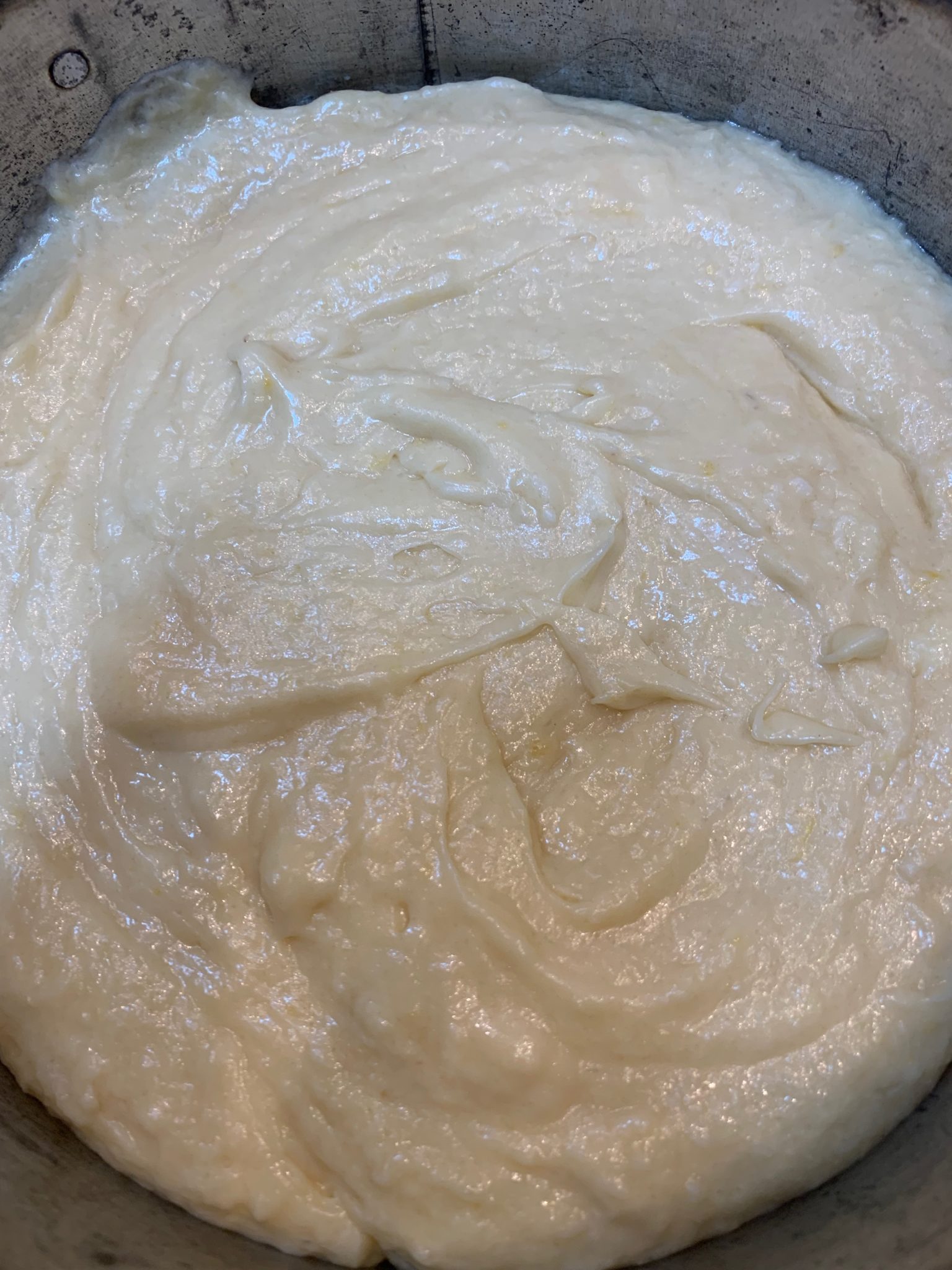 Butter cake batter in pan