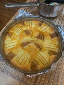 First glazing of cake in pan