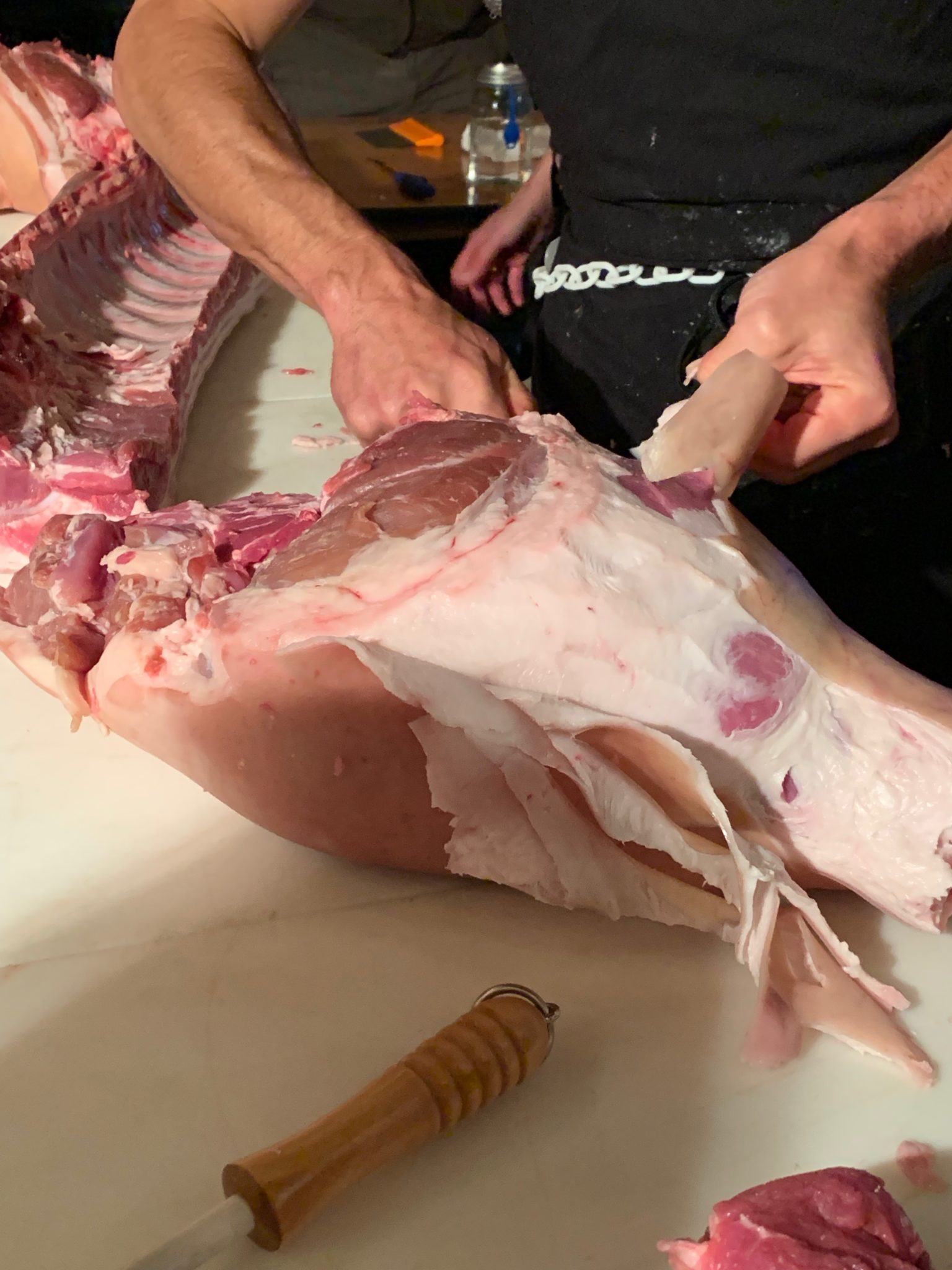 Hog leg being butchered