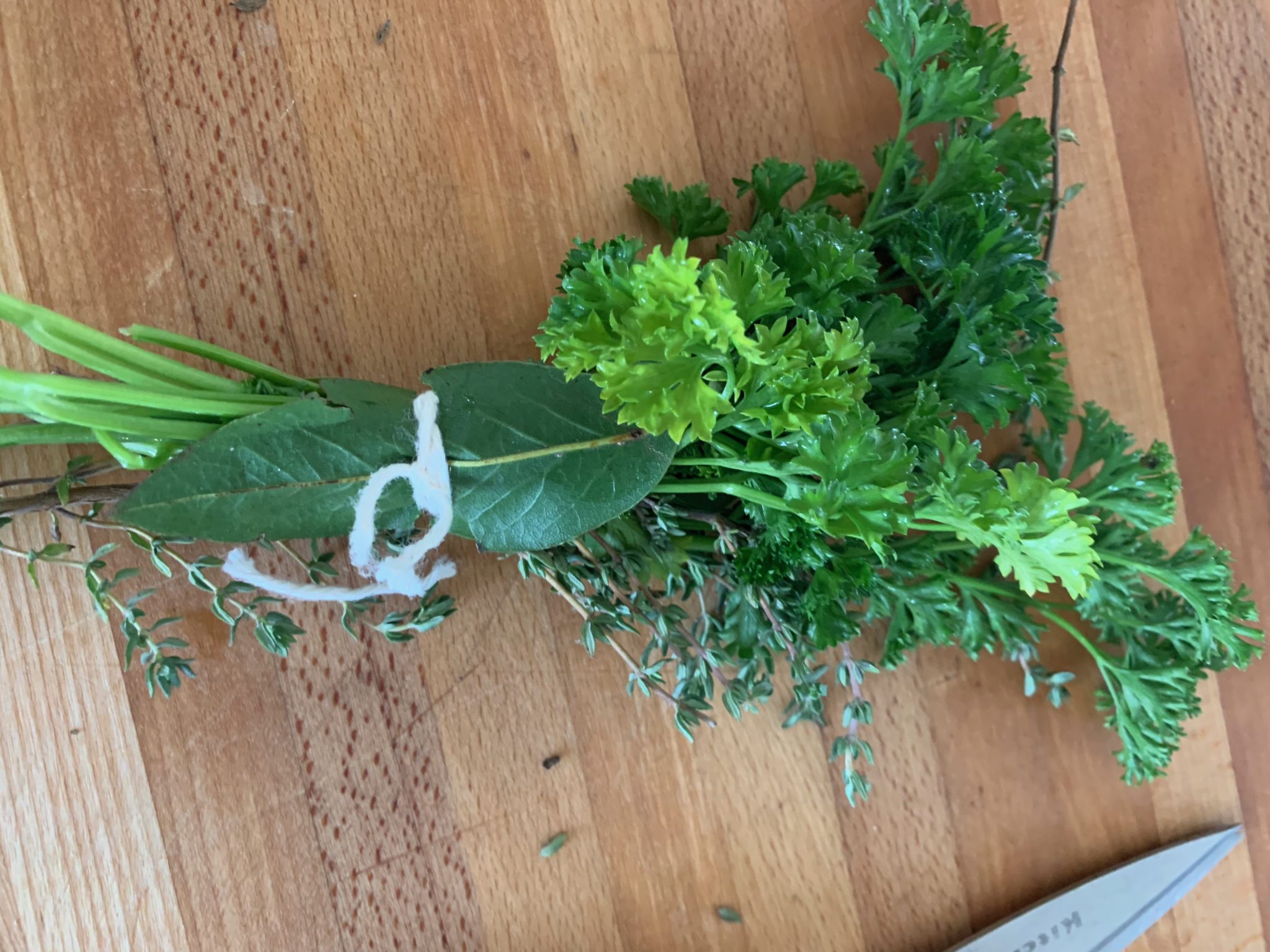 Herbs tied together in a bouquet garni