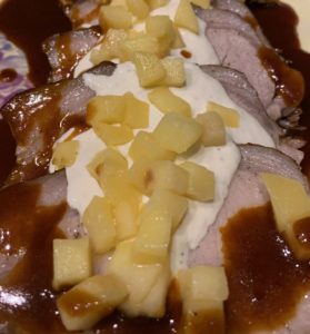 Finshed Pork Loin with Horseradish Creme Fraiche, Sauteed Apples and a Rich Demi-Glace Sauce