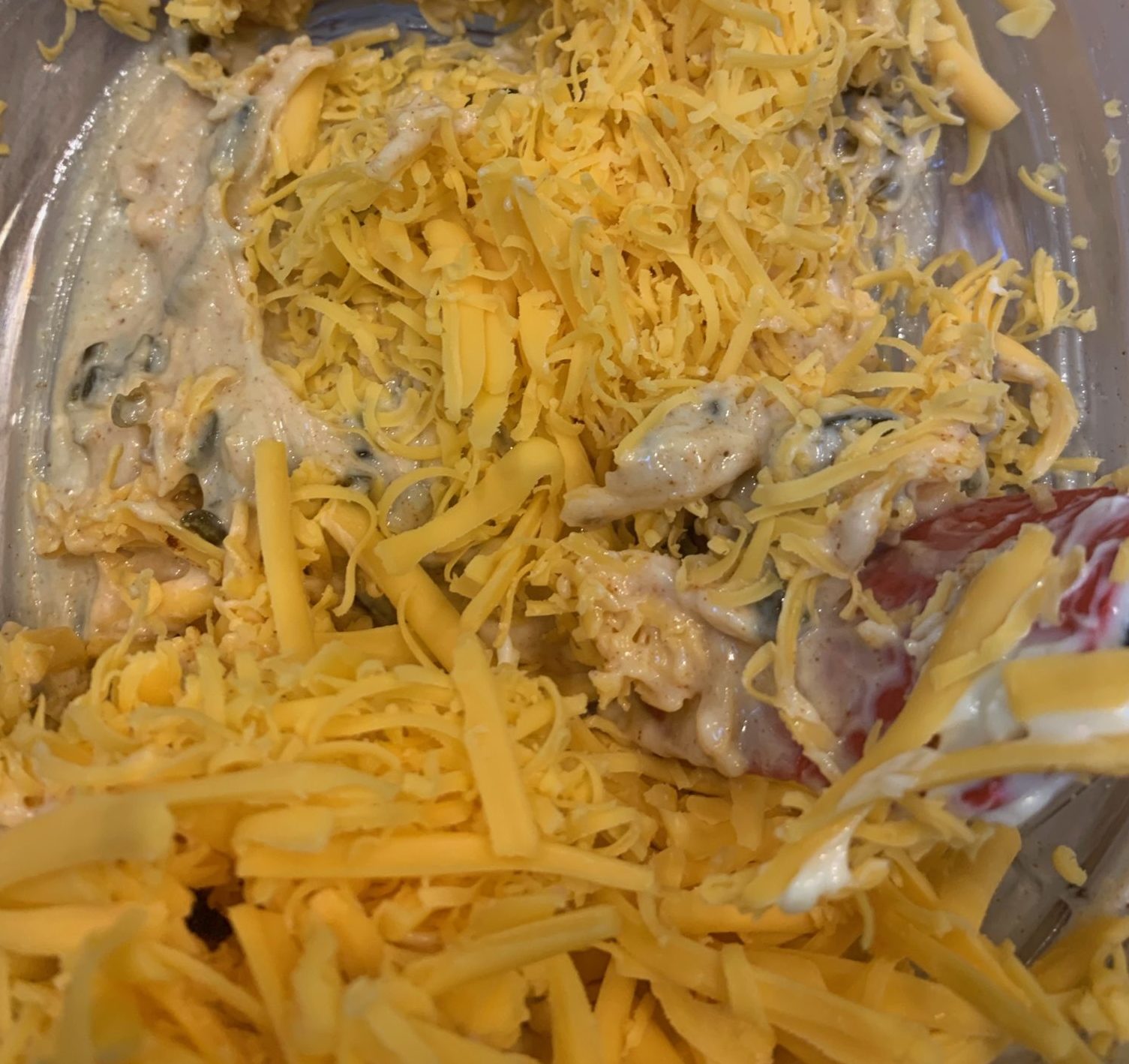 Showing two textures of grated cheese