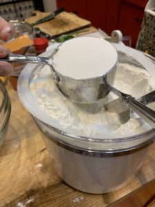 Flour leveled in a one cup measure
