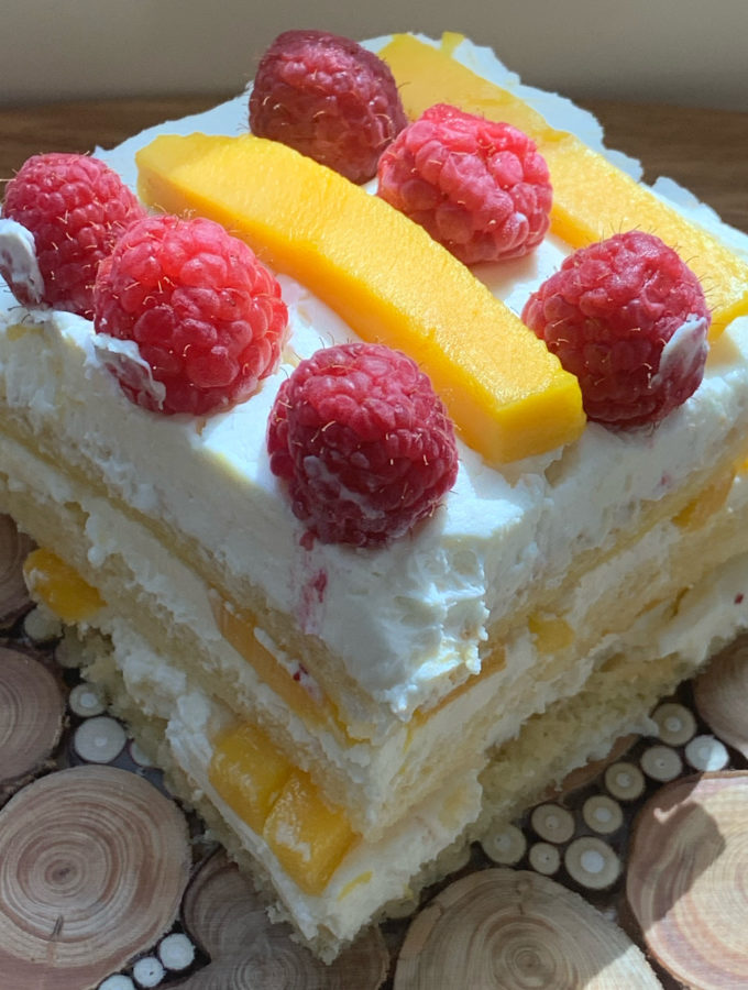 A slice of Mango Passion Fruit Tiramisu cake