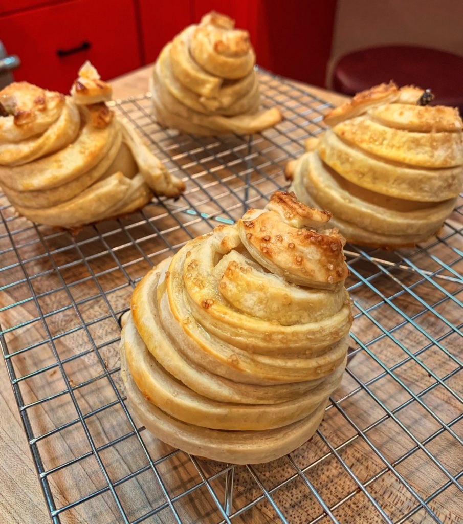Poached pears baked in puff pastry