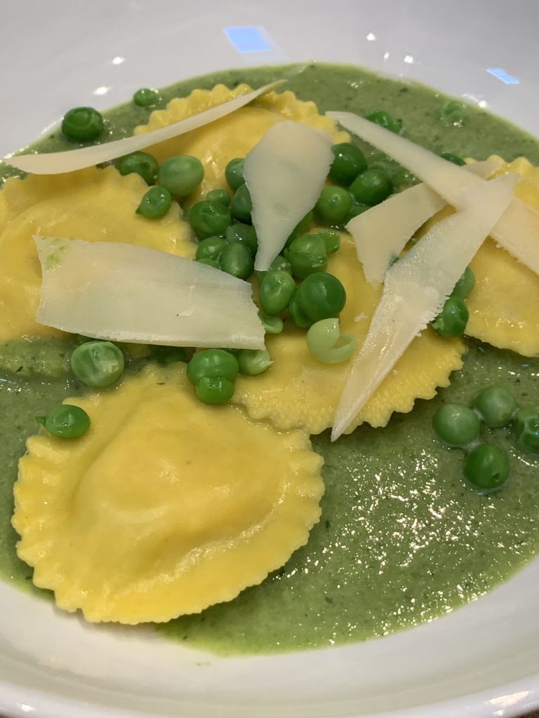 Ricotta Ravioli with fresh peas and parmesan