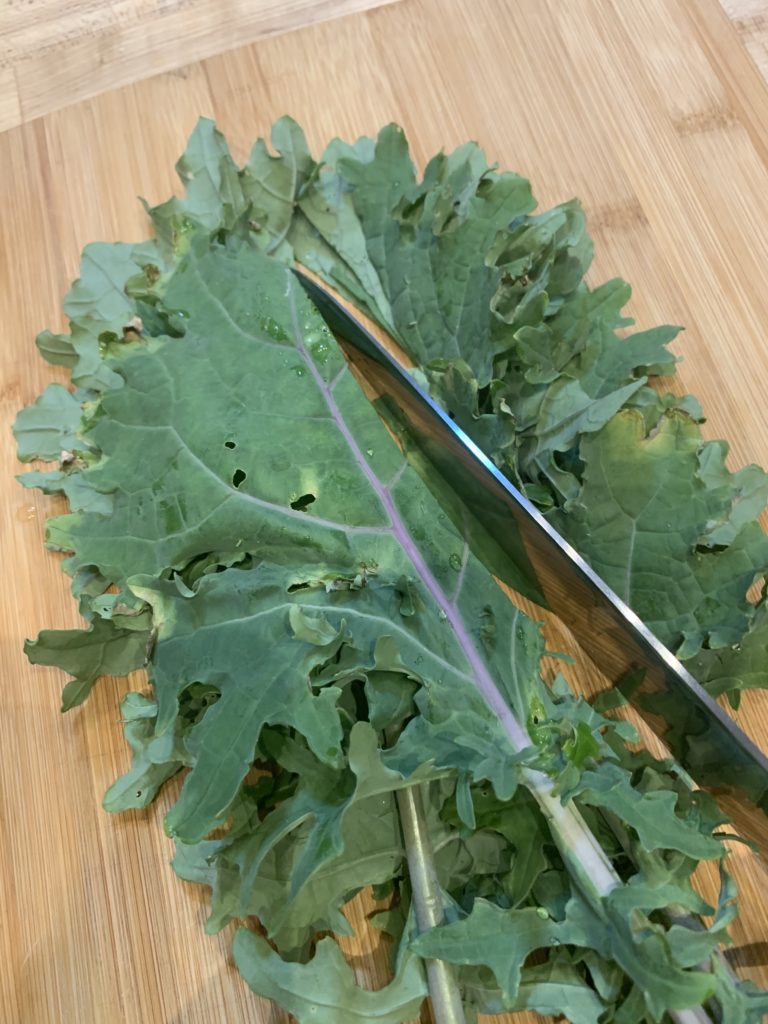 Separate the stem from the kale leaves
