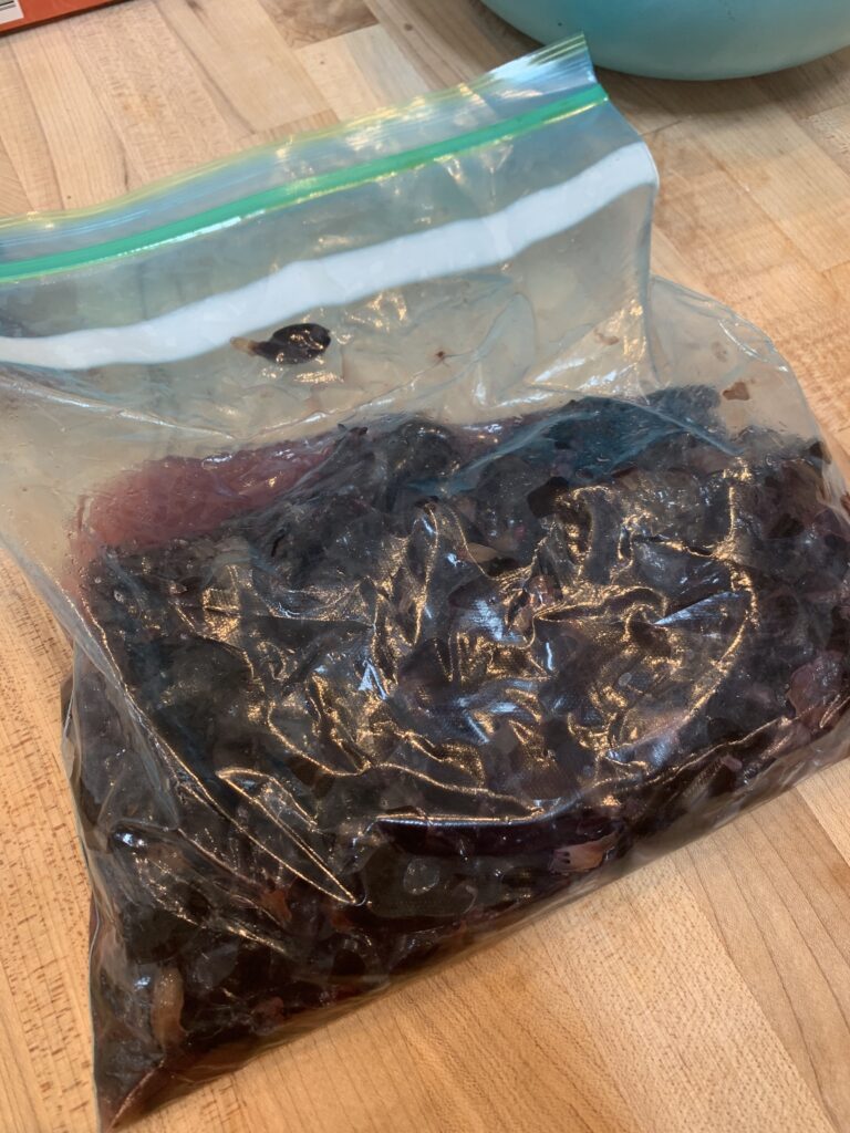 Concrod Grapes being juiced in a bag