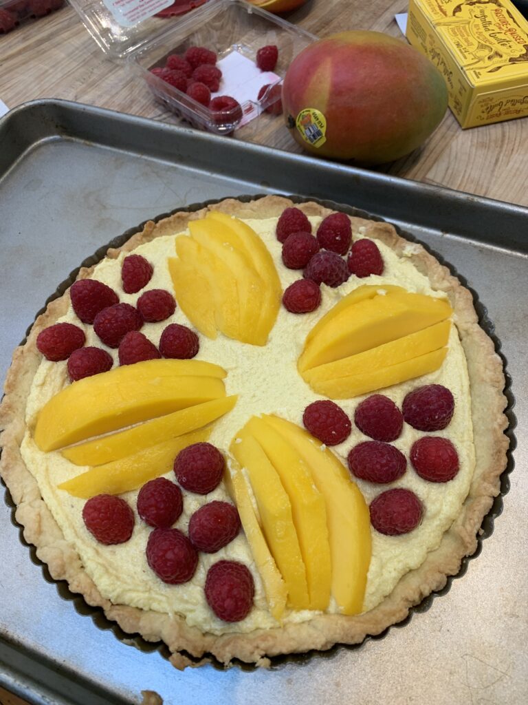 Mango raspberry tart before baking
