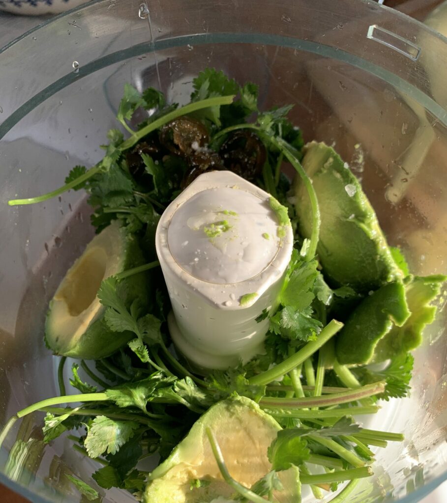 Cilantro Lime Sauce ingredients in a food processor