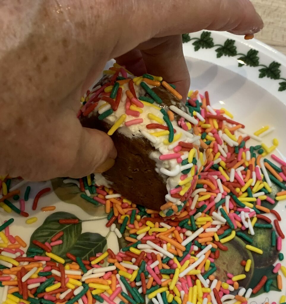 Roll the ice cream sandwich in sprinkles