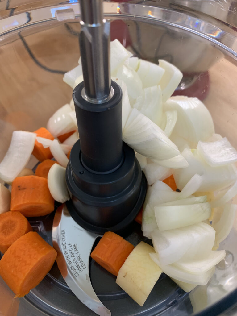 Dicing vegetable in a food processor