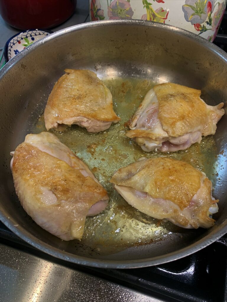 chicken browned in oil