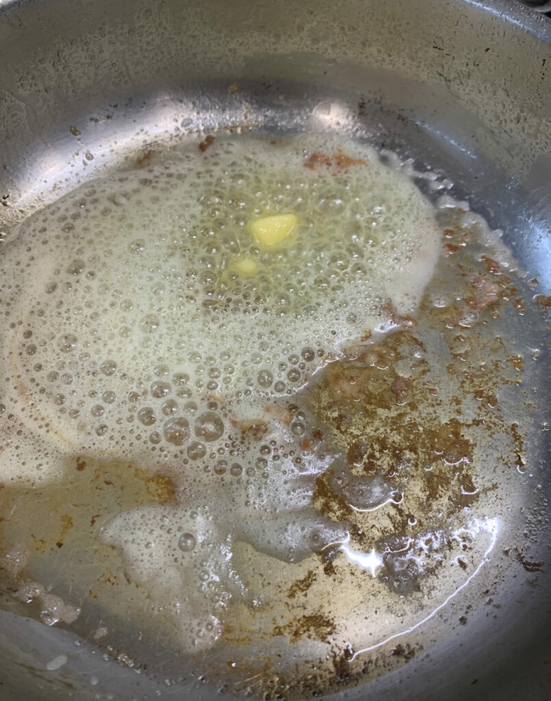 Butter bubbling in a pan