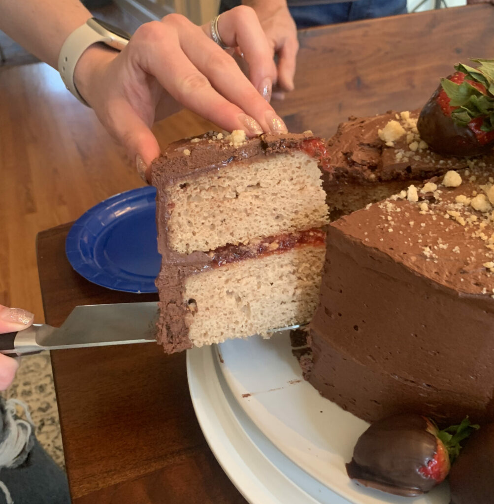 Showing the layers of the Chocolate Covered Strawberry Cake