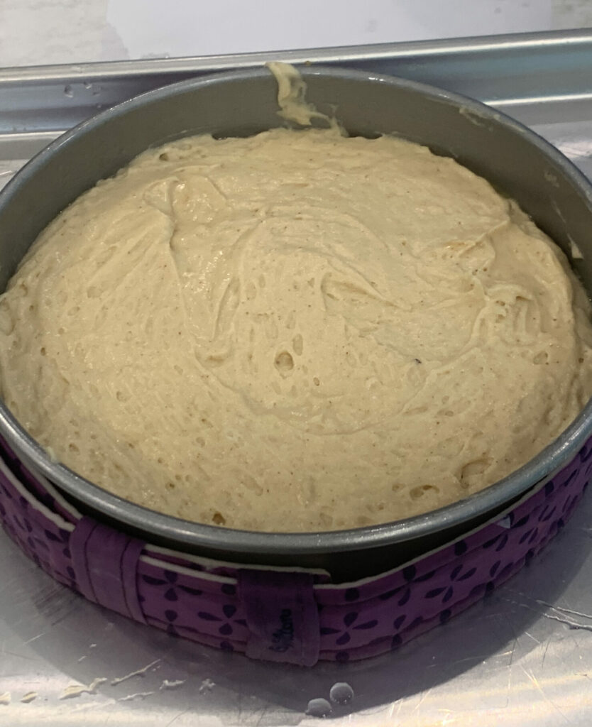 Brown butter cake batter in pan
