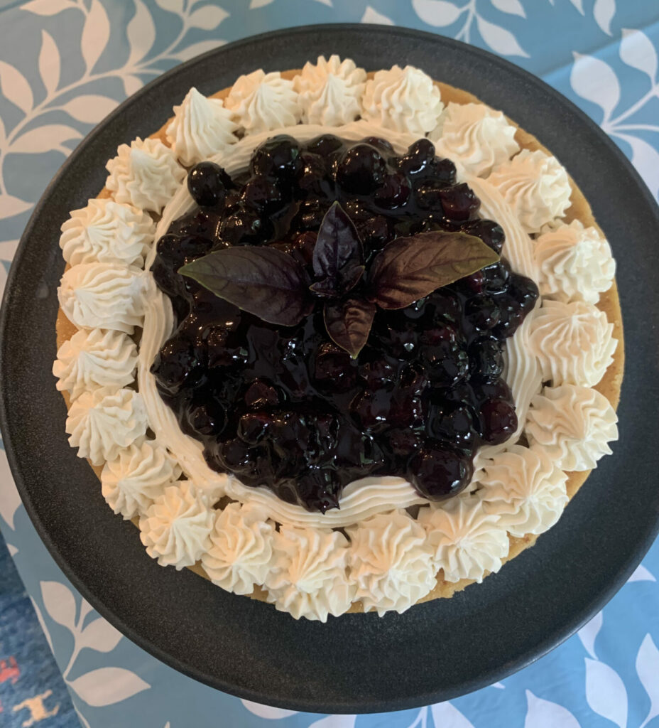 Blueberry Compote garnished with black basil