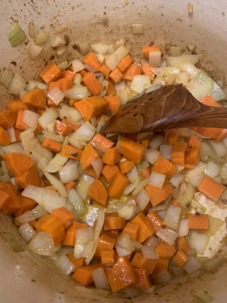 Vegetables softening in a dutch oven