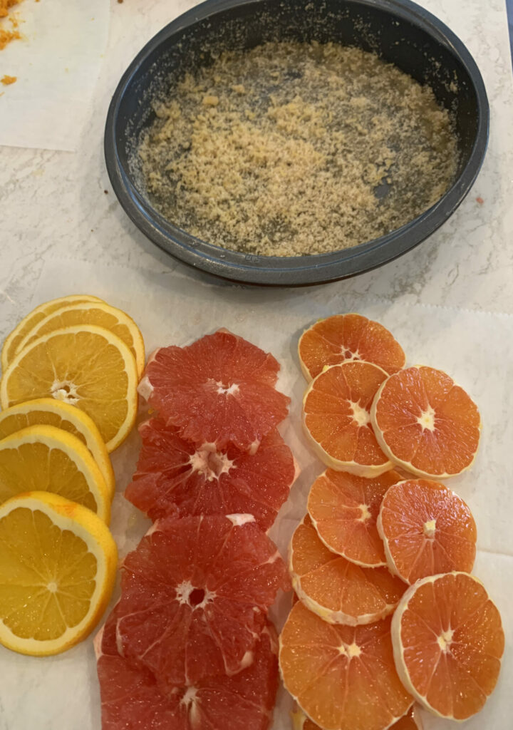 Oranges, grapefruits and pink oranges for an olive oil cake