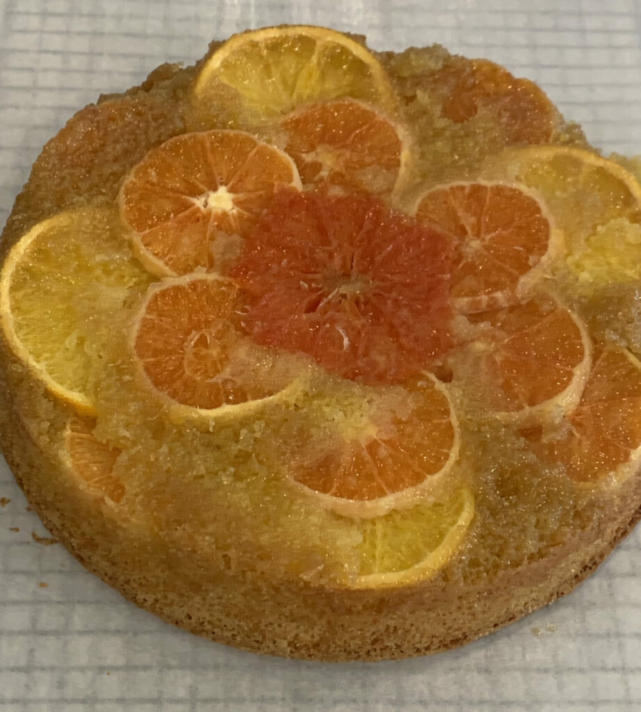 Winter Citrus fruits on an olive oil and aldmond cake