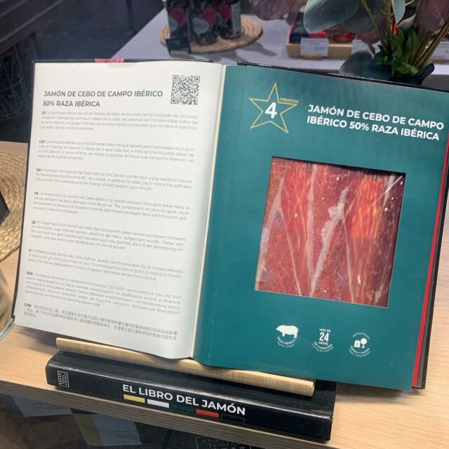 One of the best parts of a European transit airport is the shops!  I’m in Barcelona on my way to Germany. I was seriously tempted by this “Book of Ham”. Each page is a package of a different Jambon!  #iykyk #ifyouknowyouknow #awomancooks 
.
.
.
.
#ashevillefoodie #ashevillefoodieontheroad #spanishham #jambon