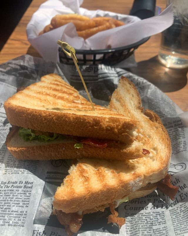 Sandwich in the sun!  Down at the beach the wind was cold but a sheltered table in the sun was lovely. Fried green tomato BLT! #lunchalfresco #thebeachinthespring #awomancooks 
.
.
.
.
#sandwichinthesun #friedgreentomatoblt #blt #summeriscoming #sunsetbeachnc