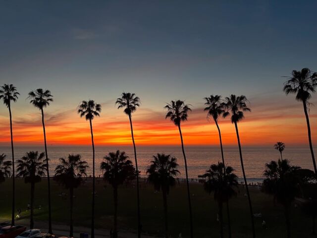 A spectacular sunset set the stage for a San Diego wedding!  #awomancooks #sunsetwedding #lajollacove