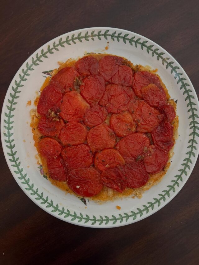 MAN I love baking!  Tomato Tarte Tatin. Check it out. Recipe is on my blog. Intense tomato flavor with a pop of sweetness and acid. #gardengrown #freshfrommygarden #somanytomatoes #tomatotart #tomatorecipes #tomatopie #tomatotartetatin #awomancooks